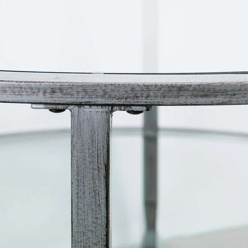 Glenn Distressed Silver Round Coffee Table with Glass Top and Shelf by SEI Furniture